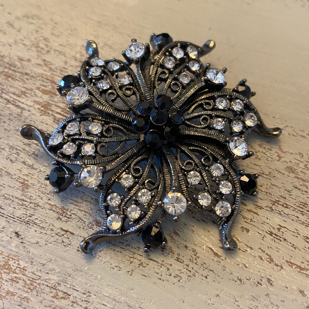 Vintage black and silver brooch